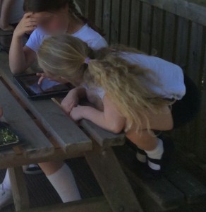 Girls outside with iPads